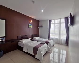 Station Inn Hotel - Segamat - Bedroom