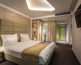 Hotel Colors Inn - סרייבו - חדר שינה