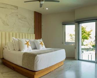 Xhiara Hotel - Xochitepec - Bedroom