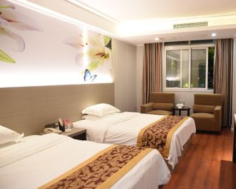 Xianyou Yue Hua Hotel - Putian - Bedroom