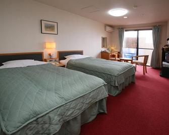 Hotel Sun Resort Shirahama - Shirahama - Schlafzimmer
