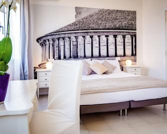 B&B 52Cento - ארצו - חדר שינה