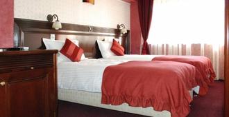 Daily Plaza Hotel - Suceava - Schlafzimmer