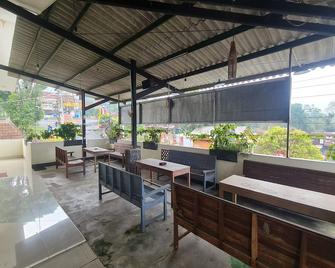 Capital O 93250 Hotel Tirta Kencana 2 Baturaden - Baturaden - Restaurante