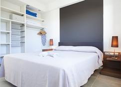 Apartamentos Marfina - Castelldefels - Schlafzimmer