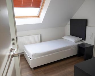 City Hotel - Philippsburg - Schlafzimmer