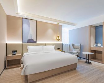 Starway Hotel Changji Oriental Plaza - Changji - Bedroom
