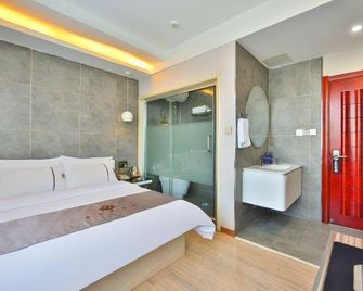 Charles Hotel (Yanji Korean Folk Park Dinosaur Kingdom Branch) - Yanbian - Bedroom