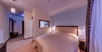Elbrus Hotel - Cheboksary - Bedroom