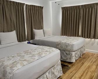 فندق بيتش بالاس - ميامي بيتش - غرفة نوم