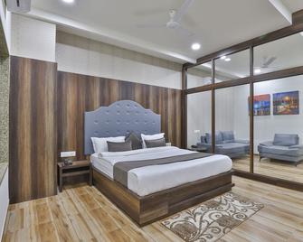 Hotel Sr Regency - Ānand - Спальня