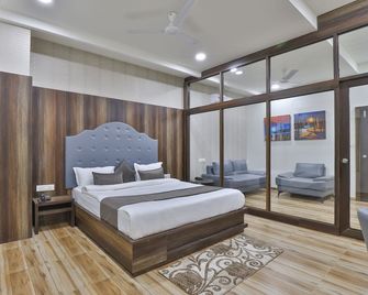 Hotel Sr Regency - Ānand - Спальня
