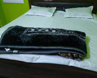 Kanak Home Stay - Varanasi - Κρεβατοκάμαρα
