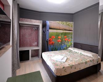 Suite Manzoni - Bareggio - Slaapkamer