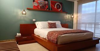 Hotel Boutique Confort Suites - Popayán - Schlafzimmer