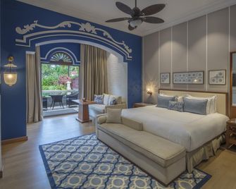 منتجع وسبا تاج إكزوتيكا، غوا - بيناليم - غرفة نوم