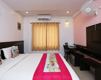 Hotel Aavass Inn Paradise - Mysore - Bedroom