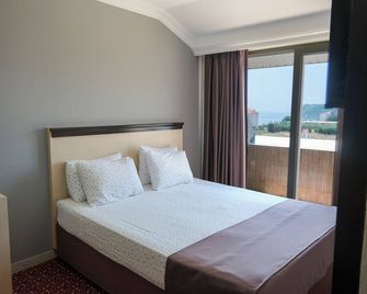 Azak Blue Otel - Okurcalar - Habitación