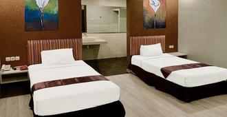 Hotel Sinar 1 - Σουραμπάγια - Κρεβατοκάμαρα