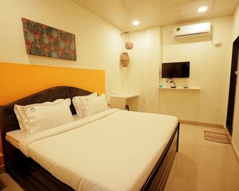 Flora Ecostay Resort And Spa Lonavala - Lonavala - Makuuhuone