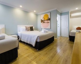 Roydons Motor Inn - טמוורת' - חדר שינה