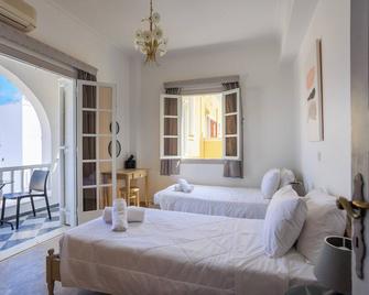 Aerno Home - Ahilli Slow Living - Thera - Bedroom