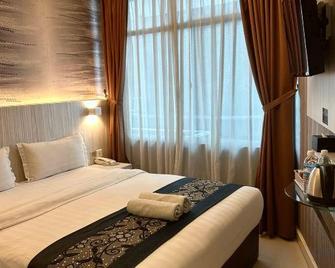 Pacific Inn - Semporna - Bedroom