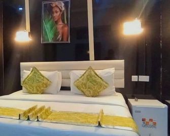 Billion Suite Hotel - Awka - Habitación