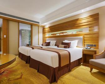 Wanyi Lijing Hotel Guiyang Huaxi Park - Guiyang - Bedroom
