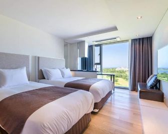 Seongsan Marina Hotel - Seogwipo - Schlafzimmer