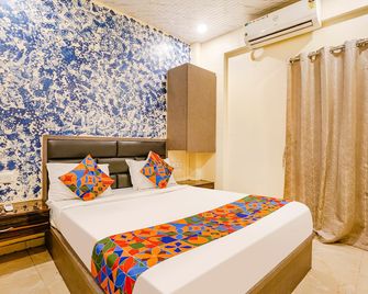 Fabhotel The United - Mumbai - Bedroom