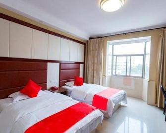 Huaining Hotel - Anqing - Bedroom
