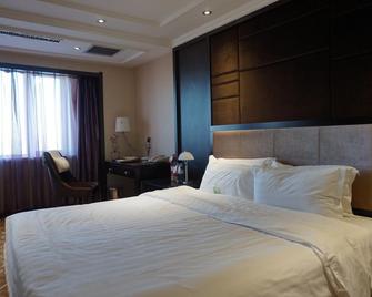Harbin Zhengming Jinjiang Hotel - Harbin - Habitación