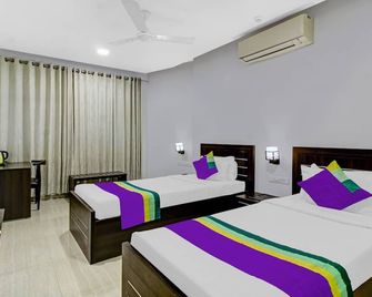 Treebo Premium Brijinn - Nagpur - Makuuhuone