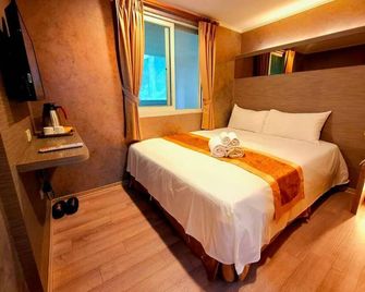Gau Shan Ching Hotel - Alishan Township - Bedroom