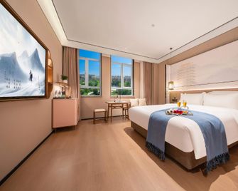 Moshang Qingya Hotel (Zibo Crystal Street University of Science and Technology Branch) - Zibo - Schlafzimmer