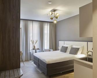 Breathe Boutique Hotel - Leida - Camera da letto