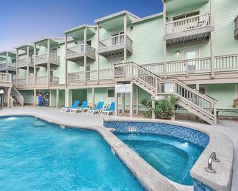 Beachfront Condo Steps from the Sand with Pool, Hot Tub, & Private Balconies - Chapman Ranch