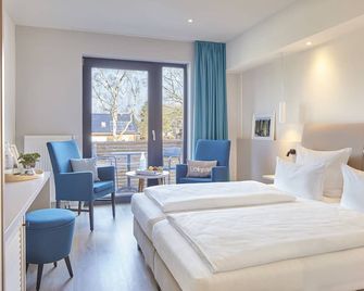 Familotel Strandkind - Neustadt in Holstein - Camera da letto