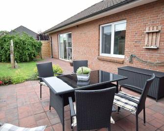 Beach whispers Modern retreat - Garding - Patio