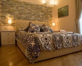 بد آند بريكفاست سنترو ستوريكو فيتيربو - فيتربو - غرفة نوم