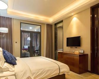 Ocean Style Holiday Hotel - Wuhan - Chambre