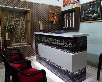 Teerth Guest House - ורנאסי - דלפק קבלה