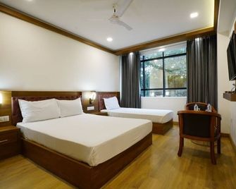Hotel Astro Marine - Kochi - Sovrum