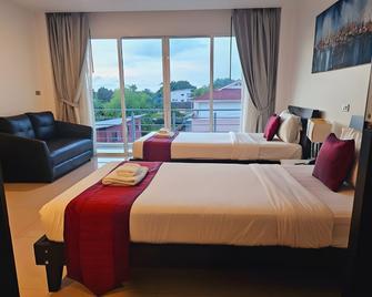One World One Home Naiharn Hotel - Rawai - Bedroom