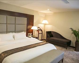 Kecheng Holiday Hotel - Cantón - Habitación