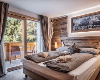 Sporthotel Romantic Plaza - Madonna di Campiglio - Camera da letto