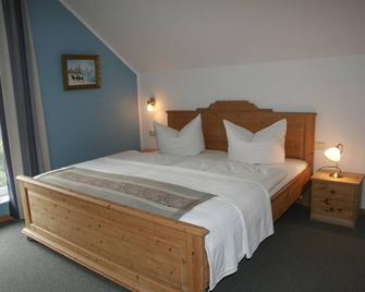 Ferienwohnungen im Haus Bi Henny - Ostseebad Baabe - Schlafzimmer