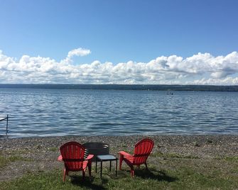 Rustic lakefront cottage - Aurora - Playa