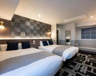 Hotel Kan-Raku Akita Kawabata - Akita - Slaapkamer